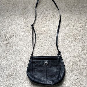 Coach Purse-shoulder bag with strap and zipper opening. Outside pocket